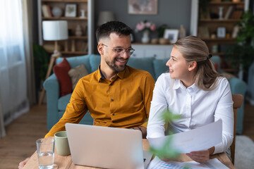Young intelligent innovative hipster couple presenting their startup new business idea via video...