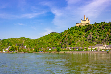 View of Marksburg (Marks Castle) on a hill with the town of Braubach along the Rhine River, Germany