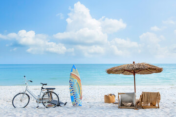 beautiful tranquil white sand beach with two beach chair and thatched umbrella with surfboard. romantic summer vacation at tropical private island for luxury sea resort advertising background.