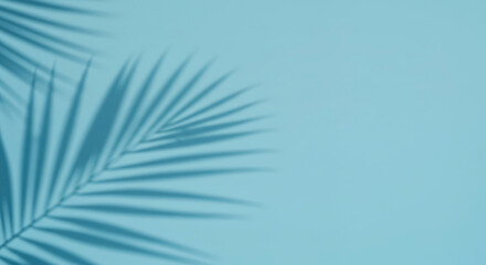 Palm leaf shadows on blue background creating tropical pattern. Minimal summer concept. Natural light effect. Vacation mood design. Resort atmosphere. Botanical silhouette texture