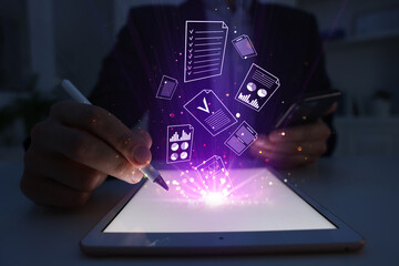 Approved. Virtual documents flying out of tablet computer. Man using device at table, closeup