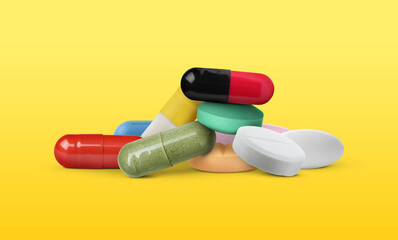 Different antibiotic pills on yellow gradient background. Banner design