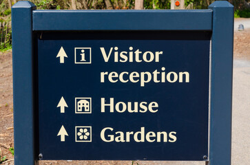 Visitor sign at country park in County Down pointing the way to various attractions