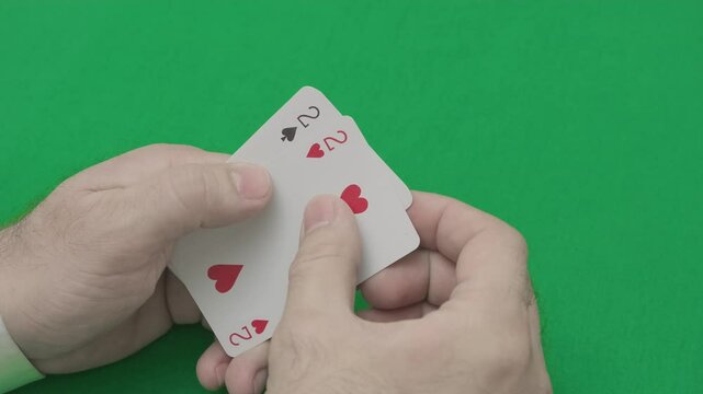card layout in full house poker is two deuces and three aces, slow motion
