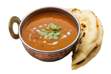 Savory Lentil Stew Creamy swirls accent the dish served with warm charred flatbread