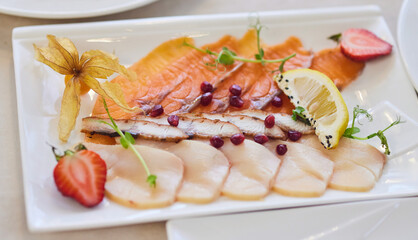 Setting the festive table. Fish slicing from various types of fish