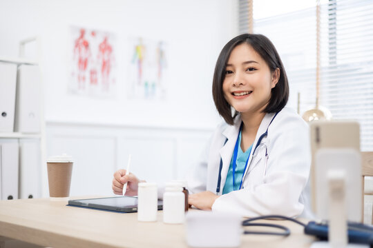 Healthcare, doctor and portrait of woman on tablet for medical analysis, research and internet. Hospital.Healthcare professional with a stethoscope.