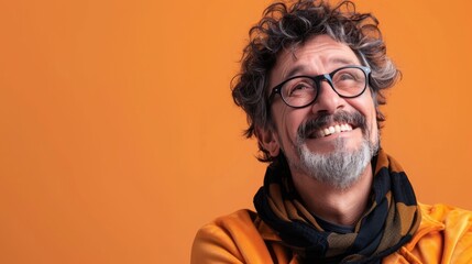 Funny Man Standing on a Vibrant Orange Background with 16:9 Aspect Ratio