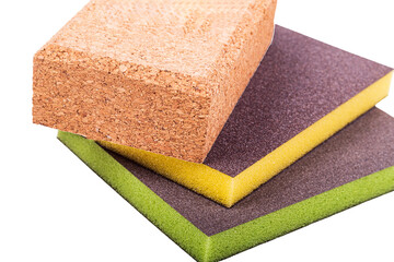 Variety of sponges for cleaning and scrubbing in vibrant colors and different textures suitable for various tasks