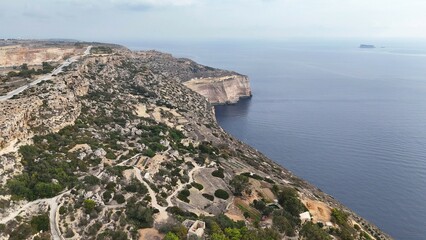 Aerial drone view of rural landscape and coastline on Dingli, Malta – captured in autumn light,...
