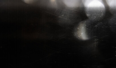 Ethereal light beams and sparkling dust particles in dark atmosphere