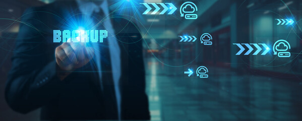 Businessman touches one technology point in their hand network connection on backup solutions, cloud storage, data recovery, disaster management, cybersecurity, technology, and futuristic systems.