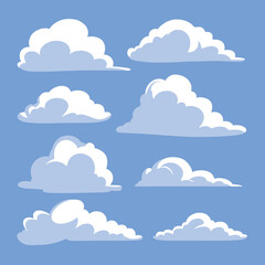 Fluffy white clouds float peacefully in a bright blue sky.