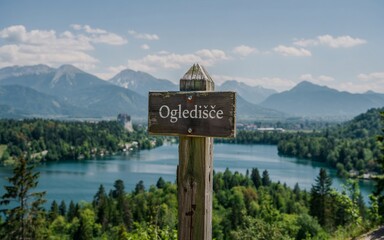 autumn Lake Bled, Slovenia, Wooden sign overlooking lake and mountains