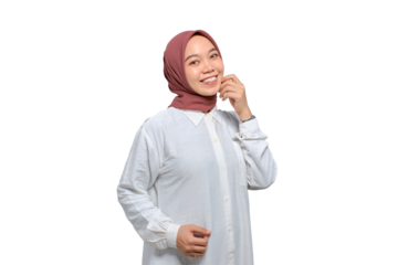 Smiling young Asian Muslim woman looking at camera feeling confident and happy isolated on transparent background
