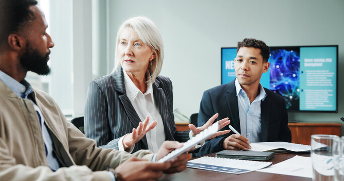 Meeting, business and people talking in office for planning, neuroscience and innovation ideas. Manager, presentation and briefing with paperwork, brain technology and proposal with neurofeedback