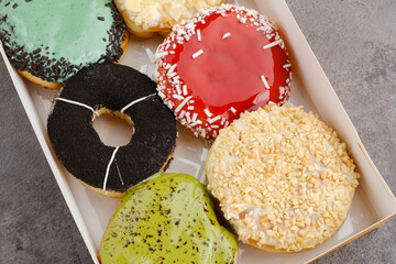 Glazed and decorated donuts, a variety of colorful donuts
