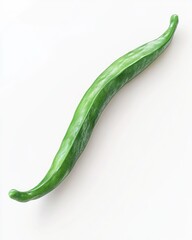 A single, curved, vibrant green bean rests on a stark white background