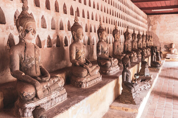 Wat Si Saket buddha temple with buddha statues in Vientiane Laos.