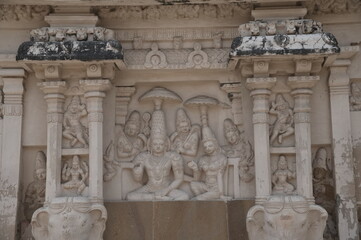 Sandstone sculptures from 8th century pallava Kailasanathar temple, Sculpture of kanchipuram temple shrine with ancient God, animal, chariot carved sandstone