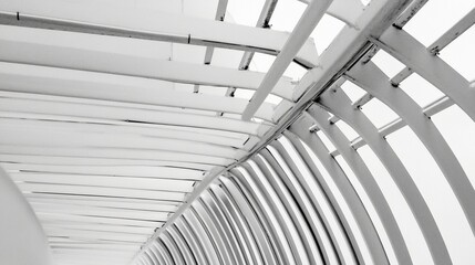 Obraz premium Detailed steel framework of a slatted urban bridge structure, captured in crisp focus with ample copy space in the clean, neutral background. 