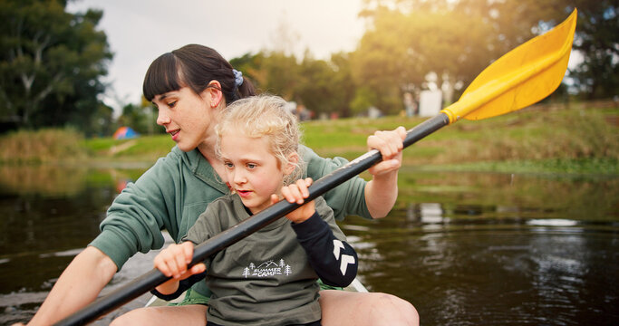 Lake, child and woman with teaching for kayak, water activity and adventure in summer camp. River, female instructor and girl with learning for canoeing, skills development and paddle outdoor in boat