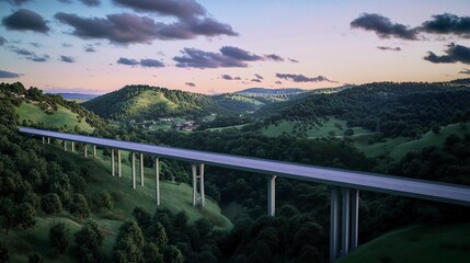 Overhead dusk scene of a motorway bridge connecting towns, spanning a lush valley of hills and forests bathed in gentle twilight tones. 