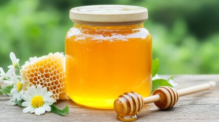 A close-up of a glass jar filled with golden honey, with a honey dipper resting beside it, surrounded by honeycomb and fresh flowers on a rustic wooden table.