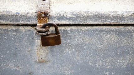 padlock in white worn chest