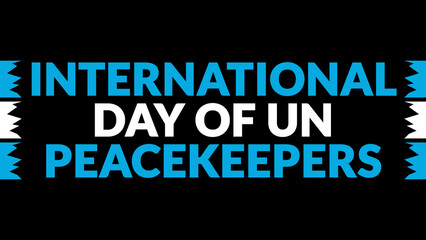 Fototapeta premium International Day of UN Peacekeepers text with side lines on a black background.