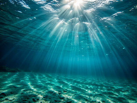 Fond de l'oc&eacute;an ave des rayons de soleil sous l'eau