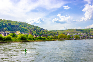 Rhine cruise past idyllic Oberwesel (Germany) on a sunny spring day