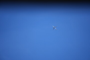 Bright blue sky with soft white clouds scattered across a clear day, evoking a sense of peace and natural freshness