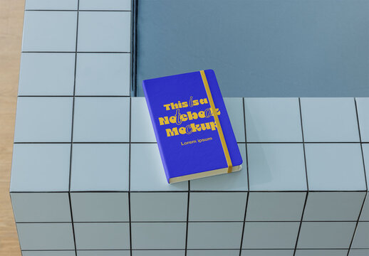Notebook Mockup on Tiled Surface