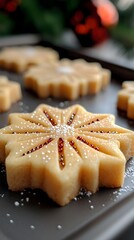 Frosted Star-Shaped Christmas Cookies on Baking Sheet
