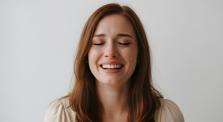 Obraz premium Portrait of a sad woman crying with tears streaming down her face expressing emotional pain and grief feeling hopeless