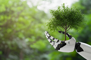 Photo of an artificial intelligence robot holding a green tree in its hand for an environmental protection concept, with a nature background