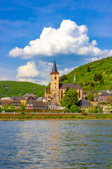 Town center of Lorch (Germany) with St. Martin Church and half-timbered houses by the Rhine