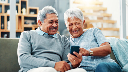 Home, browsing and senior couple with smartphone, watching and streaming of movies, online and...