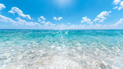 Fototapeta premium Ocean Waves Under Blue Sky with White Clouds and Sunlight