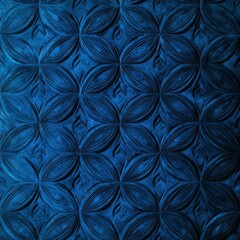 Fototapeta premium An abstract repeating floral pattern in a dark shade of blue appears across a textured surface, creating a captivating and intricate design element for backgrounds.