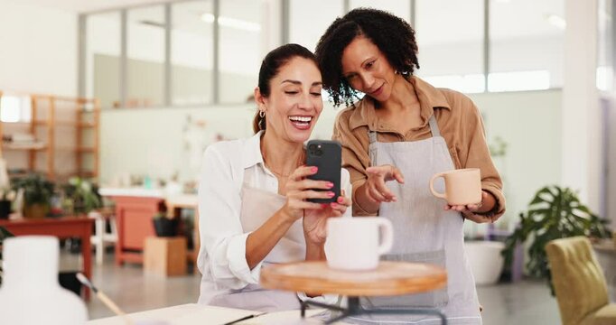 Pottery, workshop and women with phone for picture for social media, online post and creative design. Art studio, friends and people on smartphone for inspiration for ceramic, diy hobby and sculpture