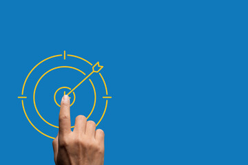 Finger Touching orange arrow on Blue Background