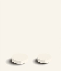 Two simple white circular podiums