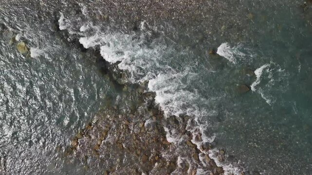 Above water high debit flow Linth river Swiss Switzerland nature pass through pebble stones