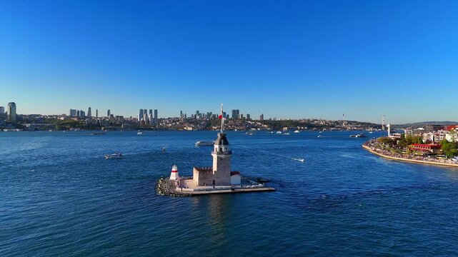 4k Ultrahd Panoramic View of Maiden's Tower and Istanbul Skyline. A breathtaking panoramic view of the Maiden's Tower (Kiz Kulesi) in Istanbul, Turkiye. Uskudar Bosphorus Leander's Tower sunny day