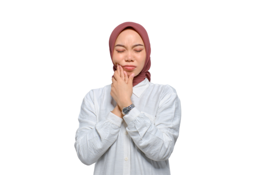 Young Asian Muslim woman feeling pain, holding her cheek with hand, suffering from severe toothache isolated on transparent background - Powered by Adobe