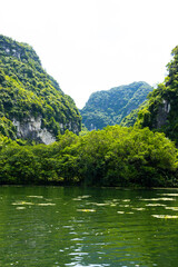 Ninh Binh, Vietnam - July 18, 2022 : Beautiful Natural Landscape In Trang An Landscape Complex Of Ninh Binh Province, Vietnam. Trang An Area Was Designated As A Dual UNESCO World Heritage Site.