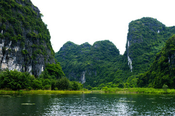 Ninh Binh, Vietnam - July 18, 2022 : Beautiful Natural Landscape In Trang An Landscape Complex Of Ninh Binh Province, Vietnam. Trang An Area Was Designated As A Dual UNESCO World Heritage Site.