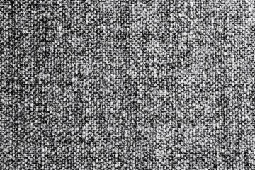 Close-up view of intricately braided. thick wool yarn showcasing texture and detail. set against a soft. neutral background. perfect for textile or fashion-related projects